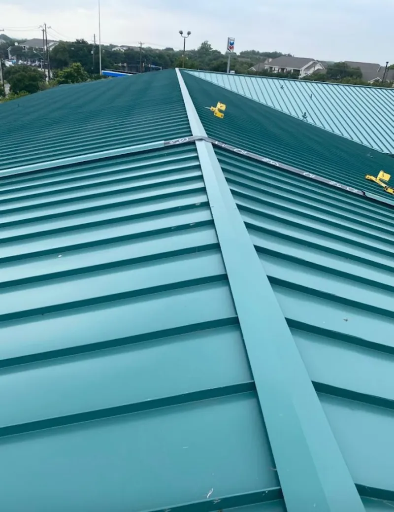 Green commercial metal roof ridge and valley for Metal Roof Repair in Sweetwater